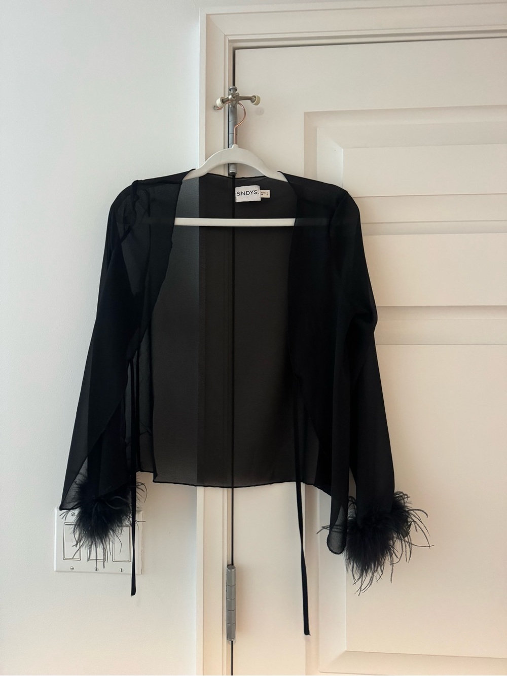 SNDYS Sheer Black Feather Cuff Tie Top